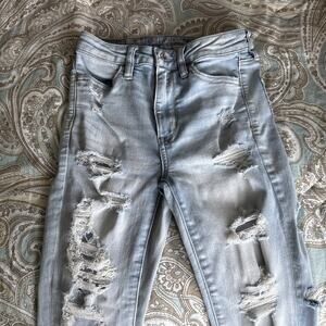 American Eagle Super Hi-Rise Jeggings Very Distressed Light Blue Size 2